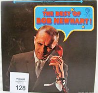Front cover of The Best of Bob Newhart vinyl LP record showing Bob Newhart with a red telephone and colorful text title.