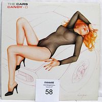 Front cover of candy-o vinyl lp showing famous Vargas artwork of a reclining woman in a sheer black bodysuit and high heels against a car outline.