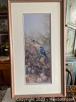 Full view of framed print showing two birds and the overall frame and matting.