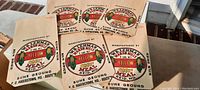 Lot of six original feed mill bags, showing the colorful yellow corn meal label with W B Lehman Marsh Mills Reid MD text.