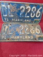 Two Maryland 1971 vehicle license plates DL 2286 with visible rust and dirt.