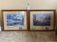 Two framed prints by Ken Zylla displayed side by side, showing the two commemorative wildlife art prints featuring ducks.