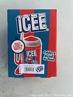 Front of box with ICEE logo and image of slushie cup with straw, noting it makes slushies in minutes.
