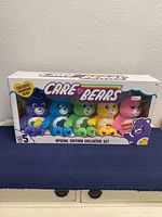 Front view of unopened Care Bears Special Edition Collector Set box showing five colorful Care Bears figurines inside.