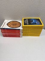 Side view showing thickness and cover design of National Geographic and In Touch magazine stacks