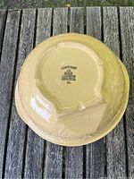 Bottom view of the smaller Gripstand bowl marked size 12 and manufacturing info
