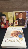 Photo of the front covers of three cookbooks: two by Rick Bayless and one by Barbara Kafka