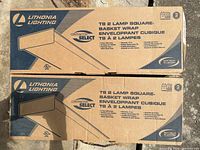 Two unopened cardboard boxes labeled Lithonia Lighting T8 2 Lamp Square-Basket Wrap with Contractor Select branding.