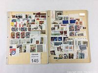 Two sheets filled with over 100 used Canadian Se-Tenets and inscription stamp blocks attached.