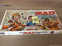 Closed box of 1979 MAD Magazine board game with colorful cartoon artwork and Parker Brothers branding.