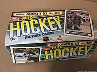 Original box labeled '1990 Topps Hockey Picture Cards' displaying it as an official complete set of 396 cards.