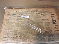 Front page of an Ottawa Evening Journal newspaper from 1897 showing the title, price (two cents), and some articles and ads.