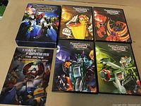 Full set including the outer box and six individual DVD cases with Transformers artwork