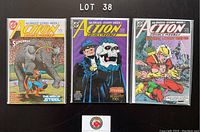 Three comic books horizontal aligned: issue 630 with Superman and elephant, issue 631 with character and skull mask, issue 632 with fight scene