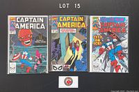 Photo showing three vintage Captain America comic books issues 370-372 from 1990, bagged and boarded.
