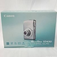 Sealed Canon PowerShot SD630 Original Box with product image and specs