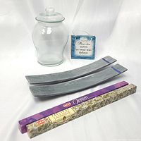Full lot showing glass jar, soapstone incense holders, incense sticks and cross gift bag