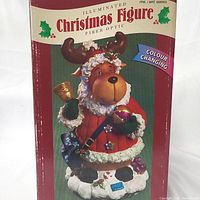 Boxed illuminated Christmas figure with fiber optic color changing lights featuring a festive moose in winter attire.