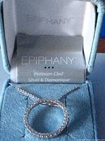 Epiphany necklace in original blue box with gray interior and brand card.