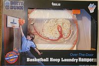 Front view of packaging showing basketball hoop with laundry netting filled with clothes, Dirty Dunk and NBA branding visible.