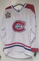 Front view of white Montreal Canadiens Heritage Classic 2011 hockey jersey with CH logo and Heritage Classic patch