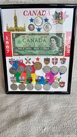 Framed set with Canadian coins and one-dollar commemorative bill 1867-1967, colorful provincial map background.