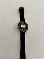 Full view of the Heidi Daus ladies watch showing the face and entire black strap
