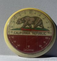 Front view of the vintage thermometer showing the California Republic design with bear and temperature scale in Fahrenheit.
