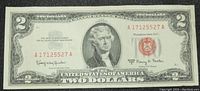 Front side of the 1963 A series US $2 bill showing Thomas Jefferson portrait, serial number, and red Treasury seal.