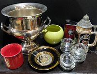 Wide view of lot showing trophy, mugs, vase, plate, candle holders, lighter, and beer stein