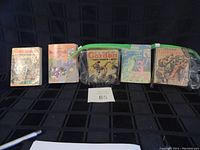 Six Big Little Books arranged in a row showing various classic cartoon and comic characters including Lone Ranger, Donald Duck, Flash Gordon, and Pink Panther with visible wear and creasing on covers.