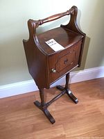 Front angle showing the smokers stand with visible door, knob, and handle.