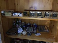 Top shelf showing multiple Empire telephone cartridge boxes of various models