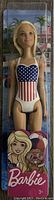 Front view of Barbie Olympic Swimmer Doll in packaging showing swimsuit and doll