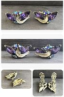 Pair of purple marquise and multicolor rhinestone clip-on earrings from front view