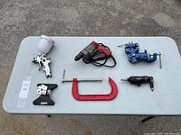 All five tools arranged on table showing complete lot