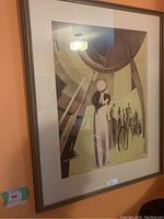 Full view of framed lithograph showing mat and frame
