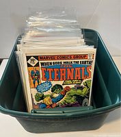View of the bin showing the front row of comics, The Eternals #15 visible, bagged and boarded.