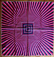 Full view of the scarf showing the entire geometric pattern with radiating stripes and concentric squares