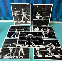 Set of 7 black and white boxing photographs laid out to show entire collection from the 1971 Denver Rocks match.