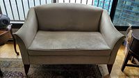 Front view of the Vogel love seat showing the seat cushion and fabric condition.