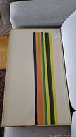 Top view of the framed print showing the vertical color stripes and gold frame