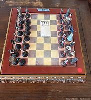 Full set of chess pieces arranged on the board showing coloration and design.