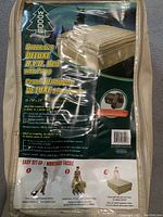Photo of Woodst Queen-Size Deluxe Blow Up Mattress packaging bag with product details and setup instructions visible.