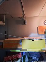Boxed Pizzelle Chef appliance with orange and yellow branding visible.