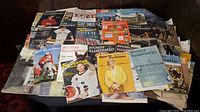 Photo showing a wide assortment of vintage magazines mostly Sports Illustrated with various athletes on covers and other general interest publications.