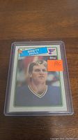 Single hockey trading card of Brett Hull rookie from Topps, in protective hard case.