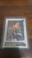 Photo of hockey trading card featuring Wayne Gretzky and Lady Byng Trophy reference.