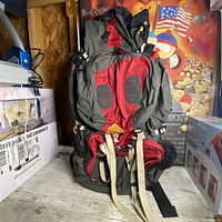Front view of a large Kelty Redcloud 6650 hiking backpack showing main compartments and straps.