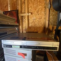 Front view of the Sony combo unit showing DVD tray open and cleaned front panel